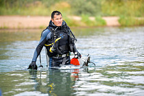 Водолазы МЧС КР провели очистку акватории озера Иссык-Куля от рыболовных сетей